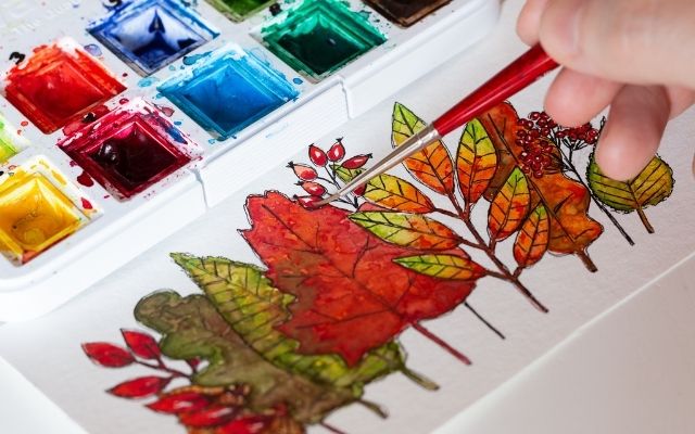 Herbsthochzeit beim Malen der Aquarelle Licht auf Papier